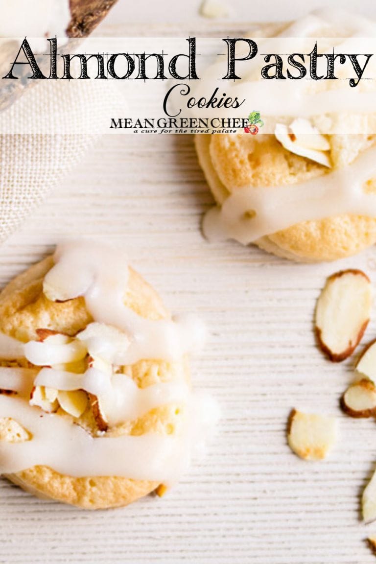 Almond Pastry Cookies on a white wooden background.