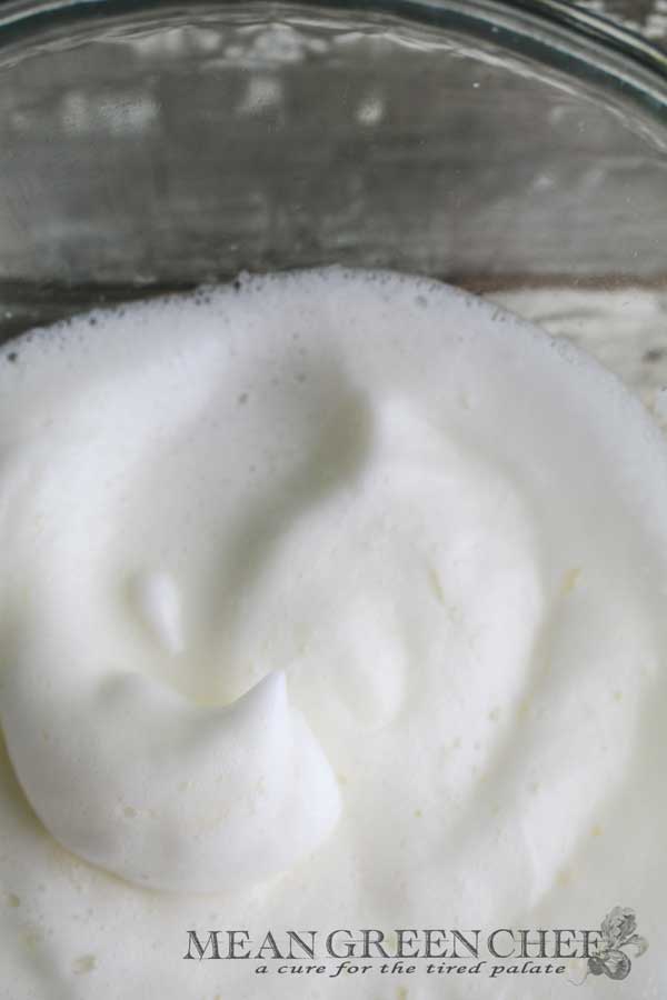 Egg whites and cream of tarter that have been beaten to stiff white peaks for our Basic Meringue Recipe