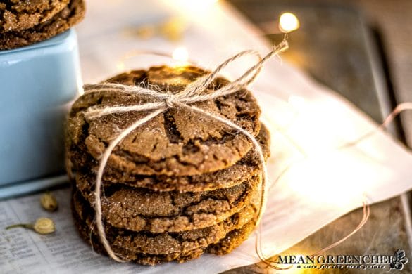 Stack of Molasses Cookies, tied with twine and sitting on a newspaper.