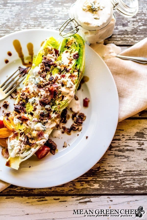 Romaine Blue Cheese Wedge Salad with bacon and balsamic reduction.