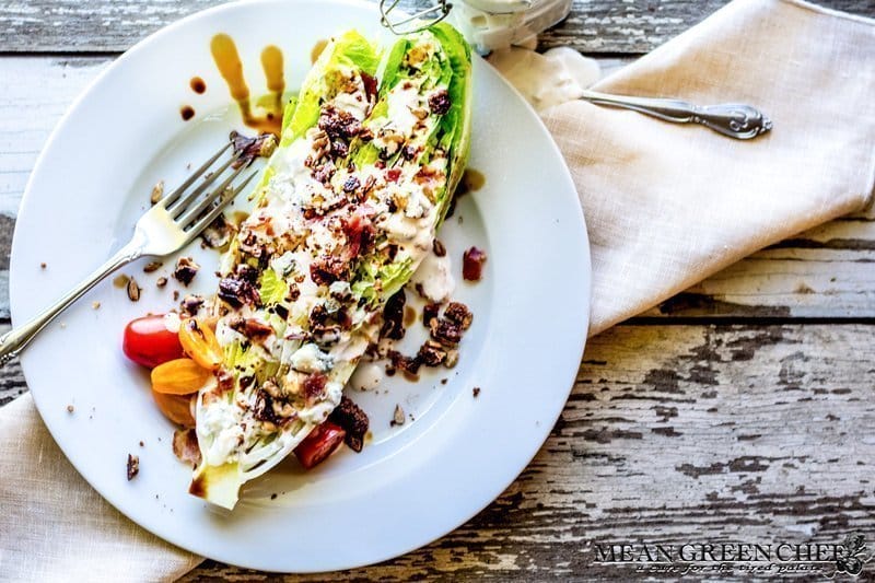 Romaine Blue Cheese Wedge Salad with bacon and balsamic reduction.