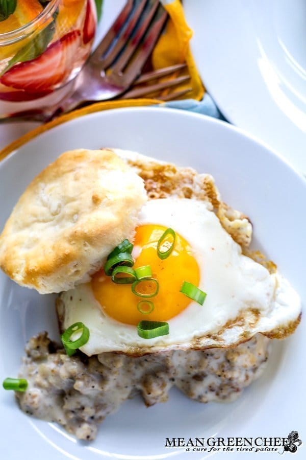 Country Sausage Gravy, served over fluffy buttermilk biscuits and topped with a bright sunny side up egg.