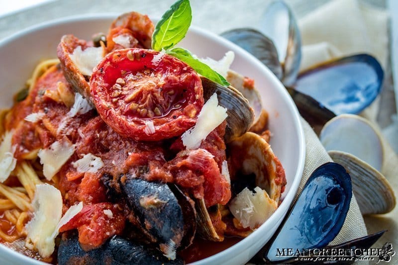 Pasta Pescatore in a large white bowl ready to be served.