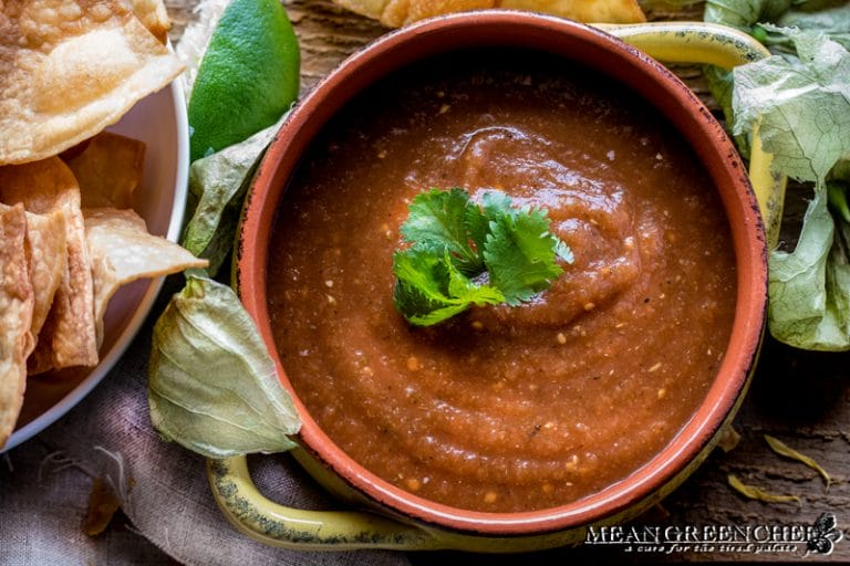 Yellow crock with Restaurant Style Salsa garnished with cilantro.