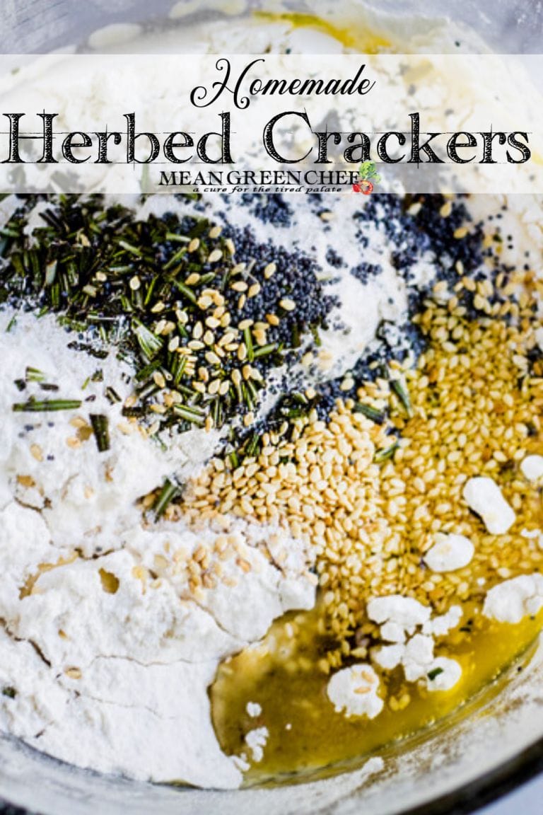 Ingredients for making herbed crackers in a glass bowl.