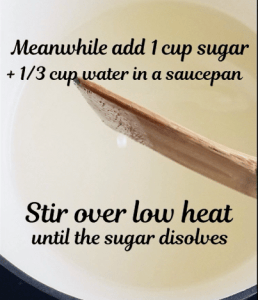 Sugar and water in saucepan for making caramel.