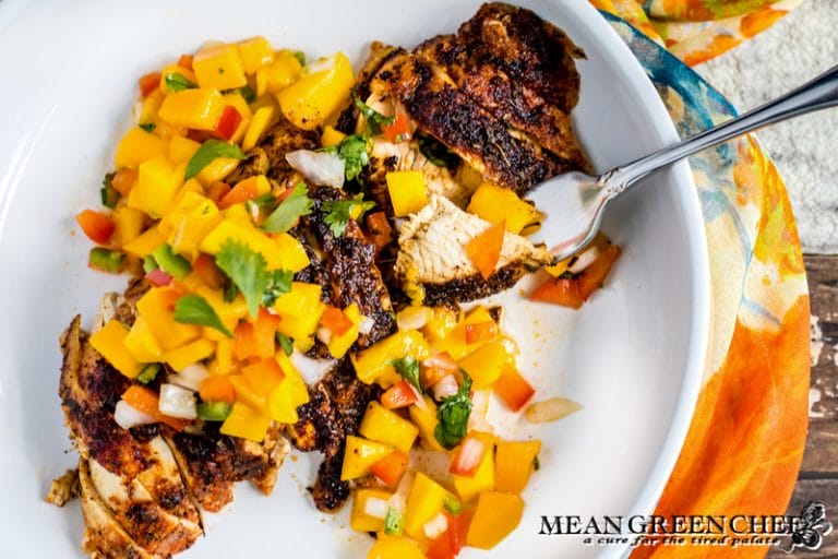 Blackened Chicken with Mango Salsa in a white bowl.