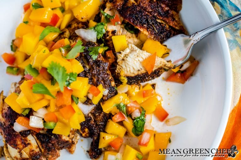 Blackened Chicken with Mango Salsa in a white bowl.
