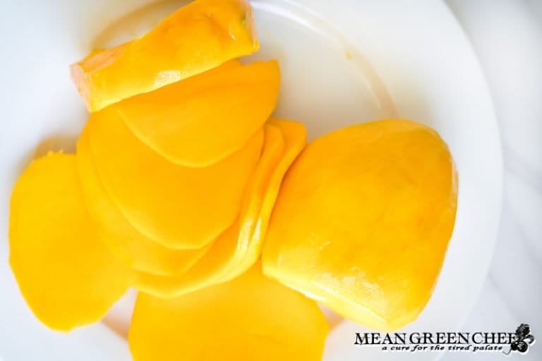 Thinly sliced mango slices.