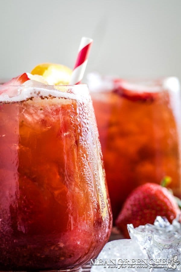 Instant Pot Strawberry Iced Tea served over ice and garnished with fresh fruit