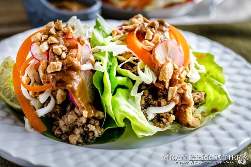 Asian Lettuce Wraps on a white Wedgwood plate.