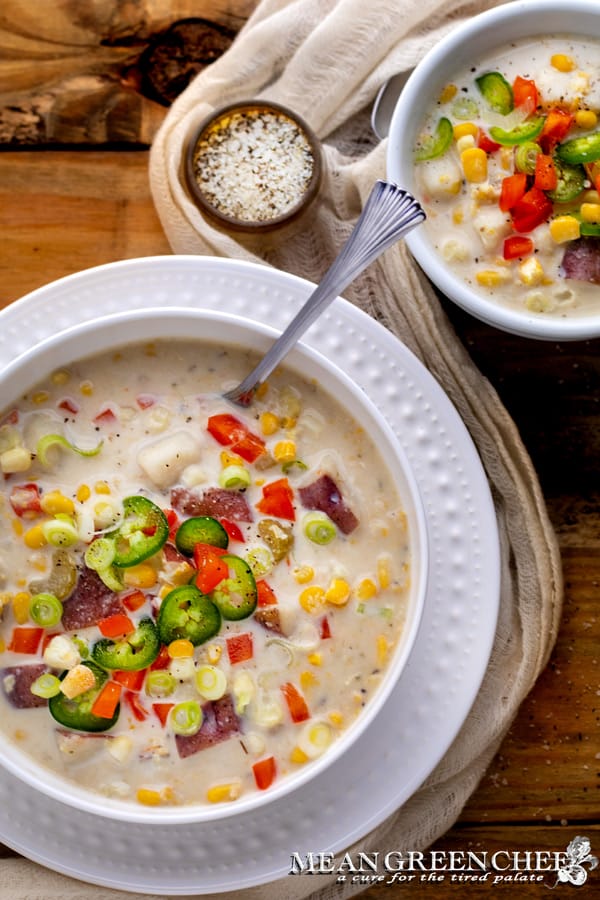 Sweet Corn Chowder in a classic white bowl on a wooden background